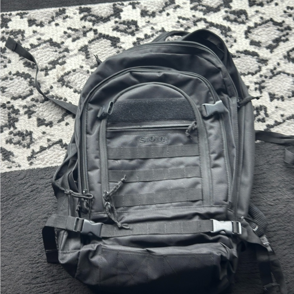 Black Quilted Jacket With Logo Patch - image 1